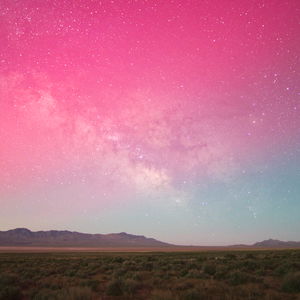 Milky Way colored pink and purple by aurora